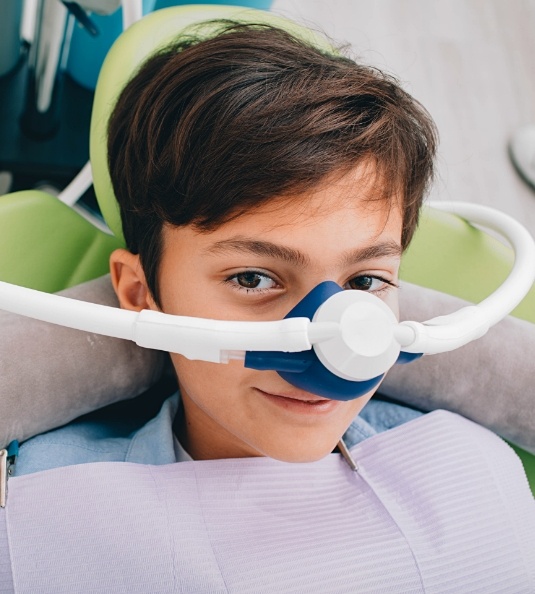Little boy with mask over nose for sedation dentistry
