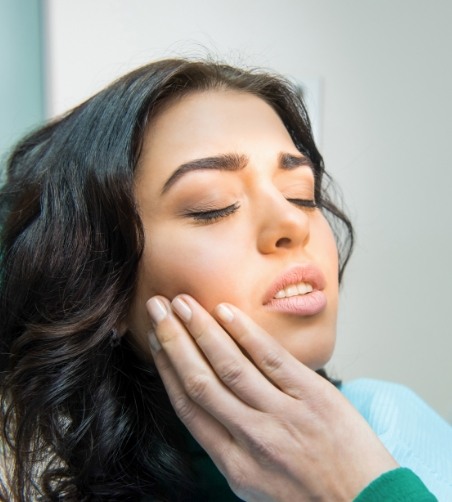 Close up of woman with tooth pain