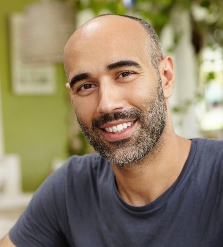 Bald man with beard smiling