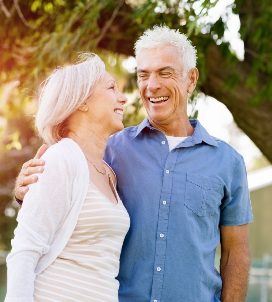 Man and woman walking together outside