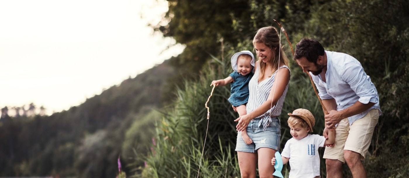 Parents with their children exploring the outdoors