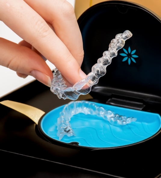 Taking aligners out of their case